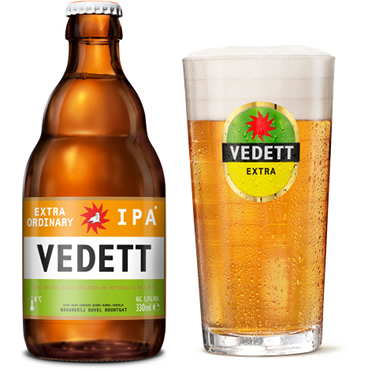 Gevuld Vedettglas met flesje Vedett Extra Ordinary IPA