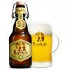 Barbãr blond honingbier met schuimkraag in Barbãrglas met beugelfles ernaast