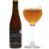 Gevuld glas Bronzen Baron Blond naast flesje