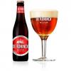 Een uitgeschonken bolleke naast een flesje De Koninck APA