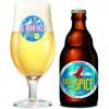 Een uitgeschonken List in Spice naast bierfles