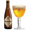 Uitgeschonken Westmalle Tripel in bijhorend kelkglas